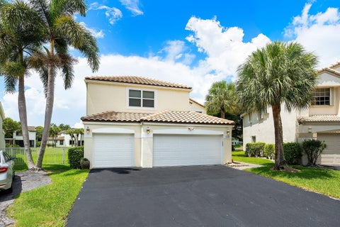 Photo of 6240 NW 76th Court, Parkland, FL 33067 (MLS # B26049556)