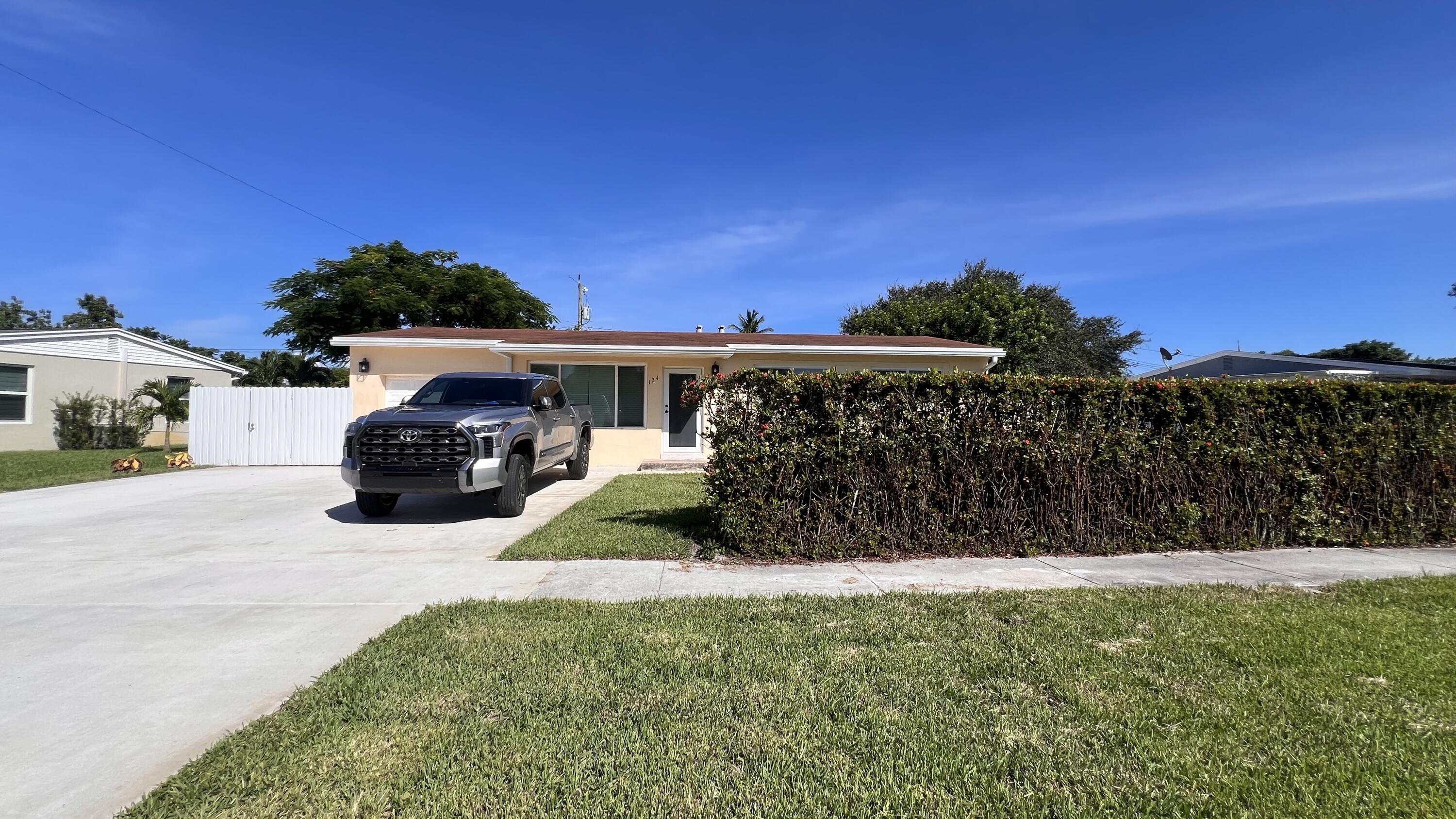 Welcome to 124 Abaco Dr in Palm Springs--an upgraded & freshly painted home tucked in a desirable, family-friendly neighborhood with a prime location near schools, shopping centers, supermarkets, parks, & more! This charming home features 3-bedrooms, 2-bathrooms, new insulation, central A/C--with full impact windows & a brand new driveway & landscaping! Both bathrooms have been tastefully upgraded, & you'll enjoy the ease of in-unit laundry (shed available in the backyard for storage). Best of all, electricity & water are included, offering great value & convenience! Pets are welcome, so bring your furry friends! There is an efficiency attached to the property, completely separated. Don't miss out on this move-in ready gem in one of the most convenient & welcoming neighborhoods!