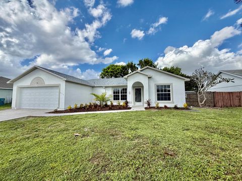 Photo of 849 SW Thrift Avenue, Port St Lucie, FL 34953 (MLS # R11135775) Photo of 849 SW Thrift Avenue, Port St Lucie, FL 34953 (MLS # R11135775)