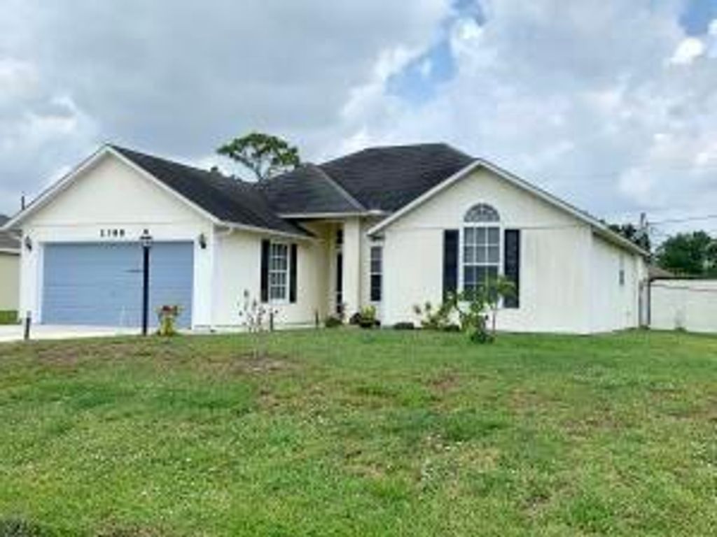 Photo of 2388 SW Fern Circle, Port Saint Lucie, FL 34953 (MLS # R10823915)
