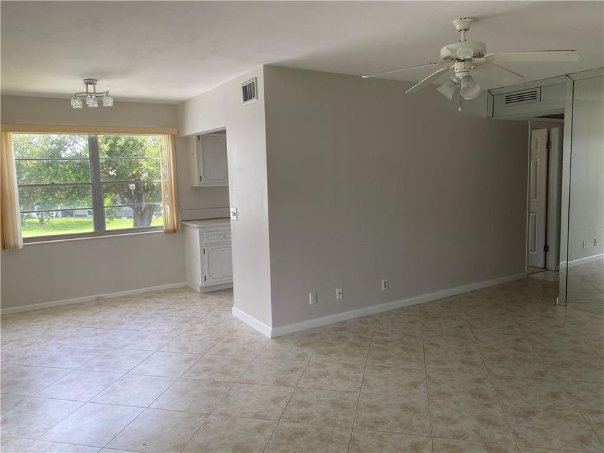 VERY NICE CORNER CONDO ON THE SECOND FLOOR, SELLER IS WILLING TO ASSIST IN FINANCING!!! LIGHT AND BRIGHT 2 BEDROOM 1.5 BATH, TILED THROUGHOUT, ONE BATHROOM HAS BEEN UPDATED WITH A SHOWER STALL, CENTRAL A/C, CROWN MOLDING IN EVERY ROOM.  THIS IS A MUST SEE!!! ASSOCIATION CLAIMS 55+ CENTURY VILLAGE HAS ALL THE AMENITIES ONE COULD EVERY ASK FOR!! THEATER, TENNIS COURTS, POOLS, FITNESS CENTER, GAME AND CARD ROOMS, PICKLE BALL, COURTESY SHUTTLE AND SO MUCH MORE! DEERFIELD BEACH IS ONLY 3.5 MILES AWAY...
