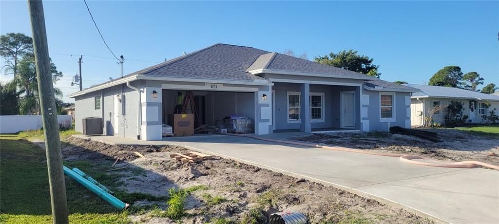 Photo of 672 SE Voltair Ter, Port Saint Lucie, FL 34983 (MLS # F10313810)