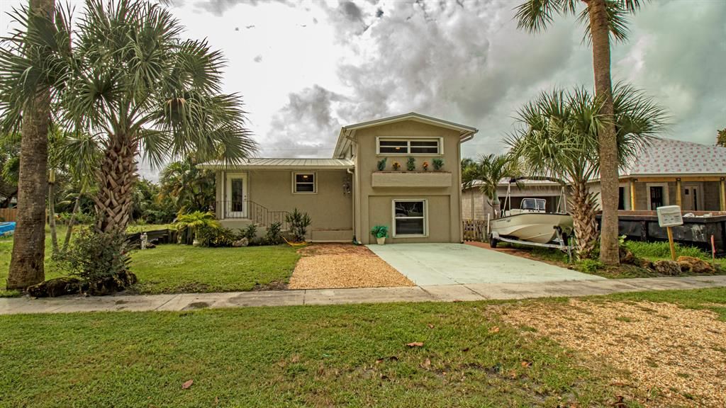 Photo of 9106 SE Venus Street, Hobe Sound, FL 33455 (MLS # R10738607)