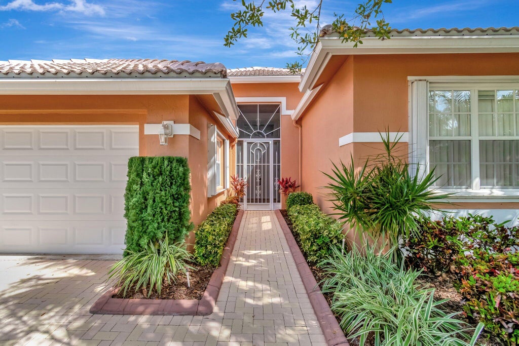 Photo of 9277 Heron Cove Drive, West Palm Beach, FL 33411 (MLS # R11068010)