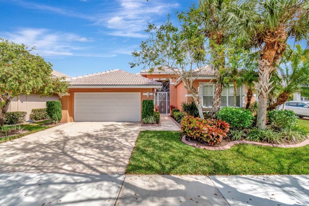 Photo of 9277 Heron Cove Drive, West Palm Beach, FL 33411 (MLS # R11068010)