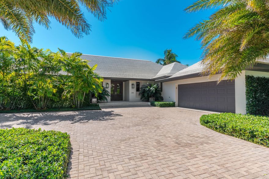 Expertly renovated jewel by AD100 designer/architect, this one story 4 bedroom/4.2 bathroom on large ''near'' North End lot is a chic PB choice. A beautiful outdoor loggia/pool area for entertaining is surrounded by tropical gardens in the most private setting. Its many features include: wide plank oak floors, high beamed ceilings, bar, marble baths, and open kitchen/breakfast. A rare find with truly top quality finishes not to be missed!