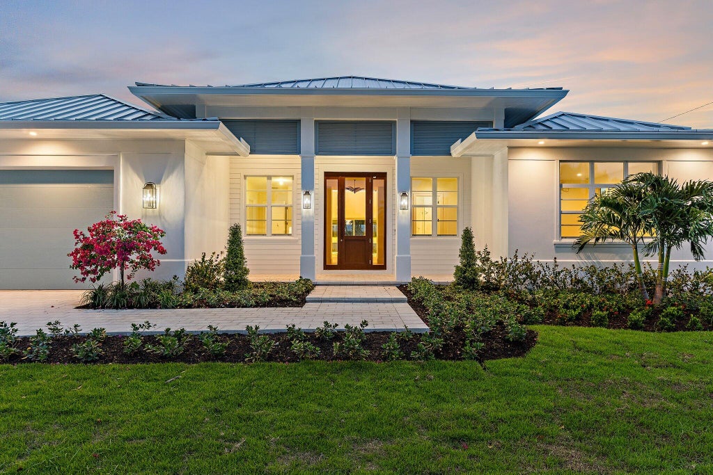 Photo of 131 Dory Road S, North Palm Beach, FL 33408 (MLS # B26074670)