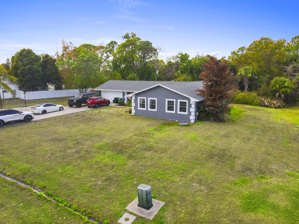 Photo of 2118 SE Morningside Boulevard, Port Saint Lucie, FL 34952 (MLS # R11166418)