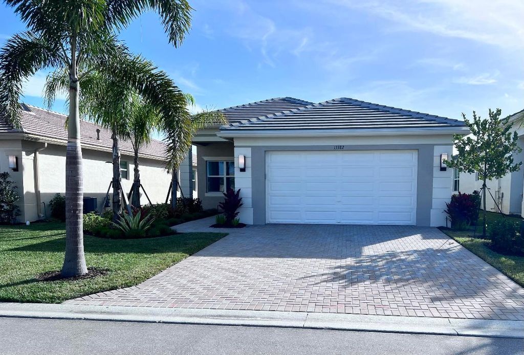 Photo of 13382 SW Ibis Shores Road, Port Saint Lucie, FL 34987 (MLS # R10949229)