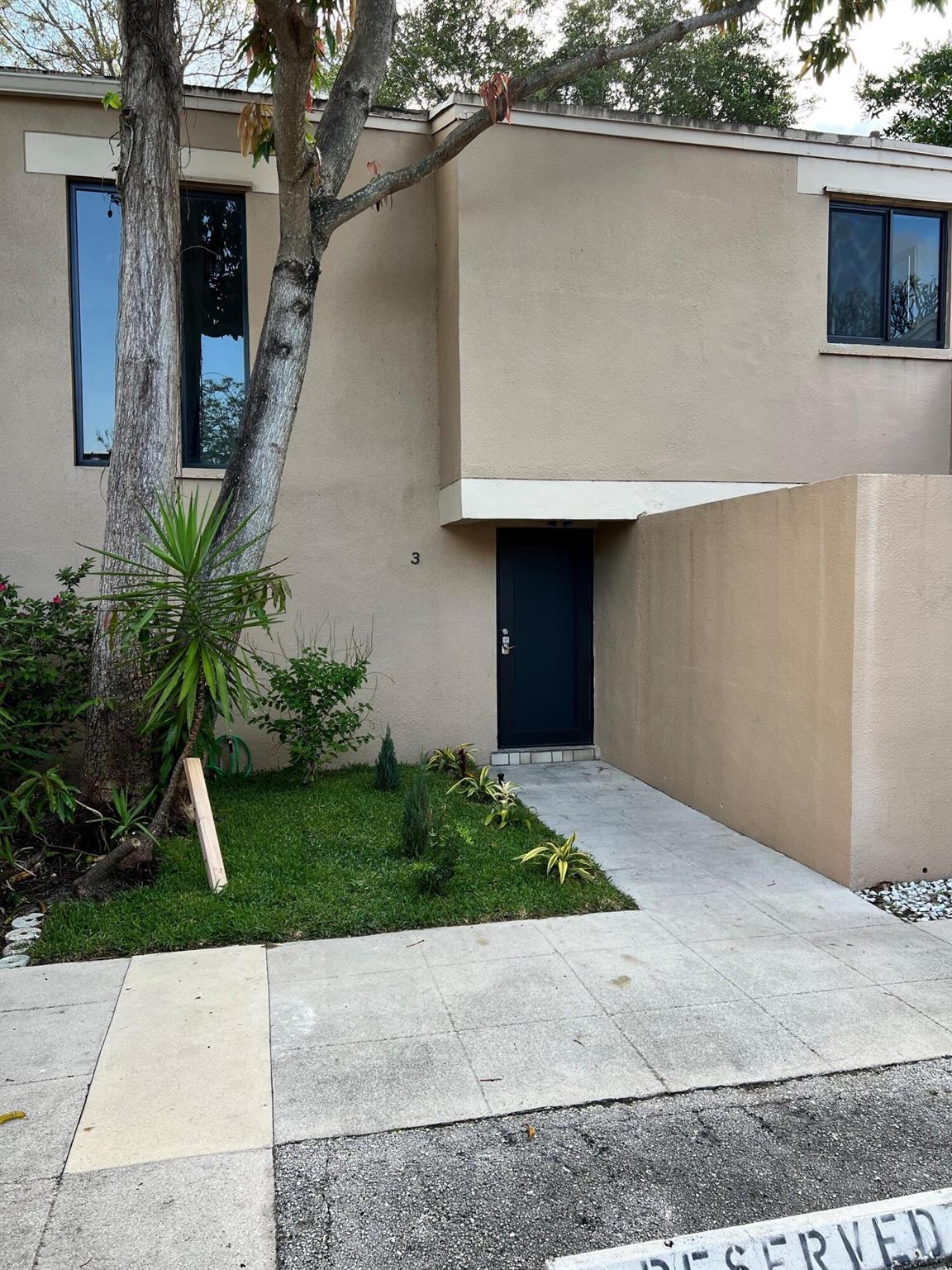 Completely renovated 2 bedroom & 1 and 1/2 bathroom Townhouse for Sale. It has a screened and covered patio, new impact windows & doors, new kitchen, new appliances, new washer & dryer inside, new A/C, and new waterproof laminate flooring, and a new roof. Great location with A rated Schools, across from FAU, close to restaurants shopping, beach, hospital, Mizner Park, and I-95. Community has a beautiful pool, clubhouse and tennis court. Don't miss this amazing opportunity.