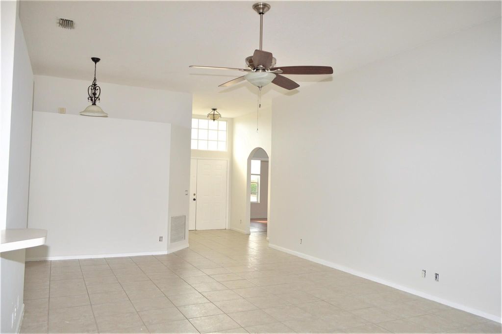 Photo of 880 NW Waterlily Place, Jensen Beach, FL 34957 (MLS # R11112773)