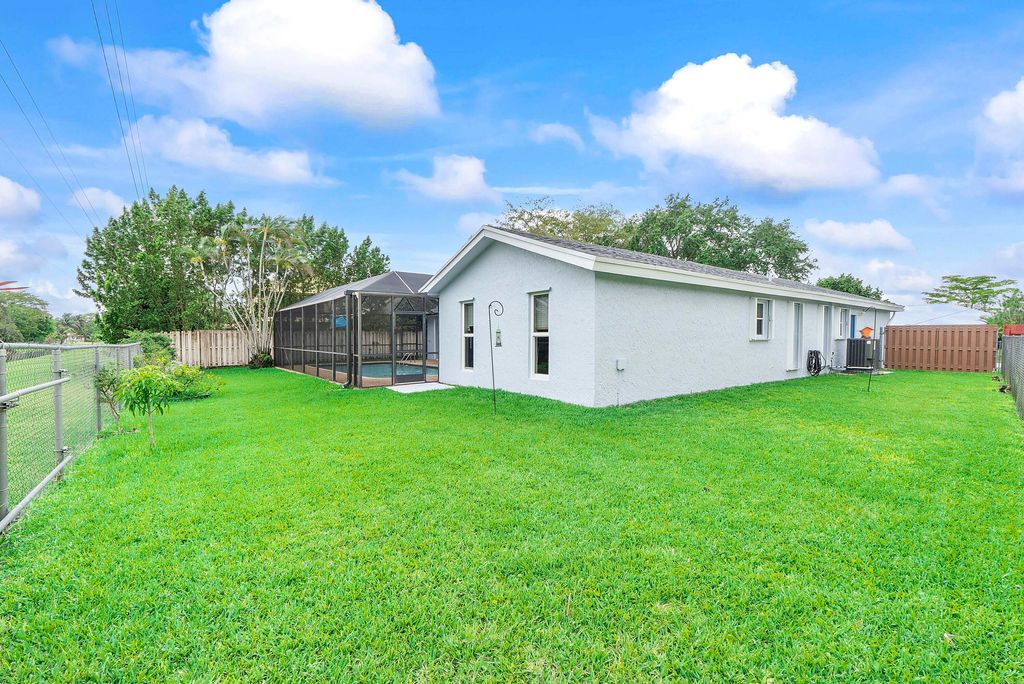 Photo of 1320 NW 76th Avenue, Plantation, FL 33322 (MLS # B26028502)