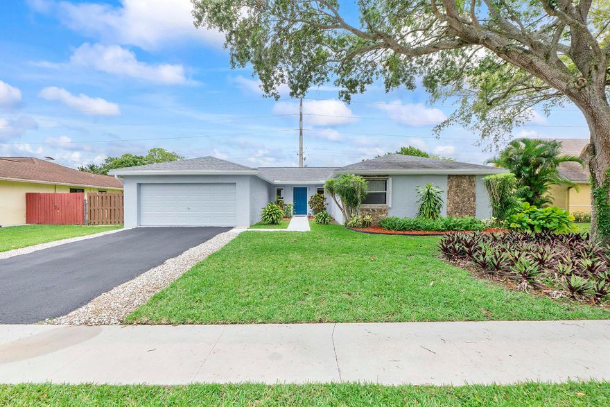 Welcome to Marcano Estates in Plantation! This beautifully maintained 3 bedroom 2.5 bath tropical pool home on the canal ~ is just waiting for you to move in! Very spacious bedrooms all with walk-in closets. New roof installed 2021 with existing warranty. Vaulted ceilings, neutral paint throughout & lots of windows to make it a light and bright space. Large open kitchen with line of sight to family room TV, pool area, living room and dining space ~ the chef in the kitchen will be in the heart of the home & in the middle of the action! Separate laundry room. Oversized fenced yard is perfect for dogs to run around, entertaining, baseball or soccer practice & fishing in the canal. All ages, pet friendly, investor friendly and NO HOA.