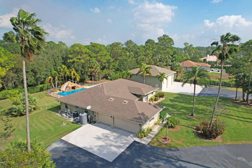 Photo of 15593 N 96th Ln Lane N, The Acreage, FL 33412 (MLS # B26015732)