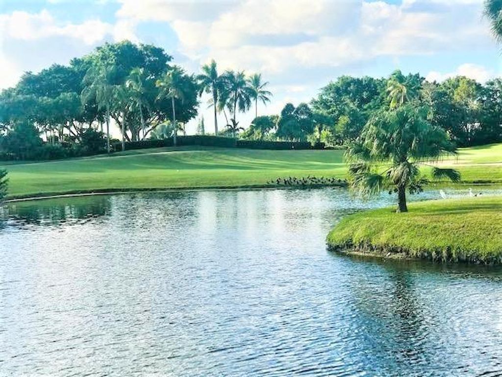 Photo of 5540 Tamberlane Circle #117, Palm Beach Gardens, FL 33418 (MLS # R10705057)