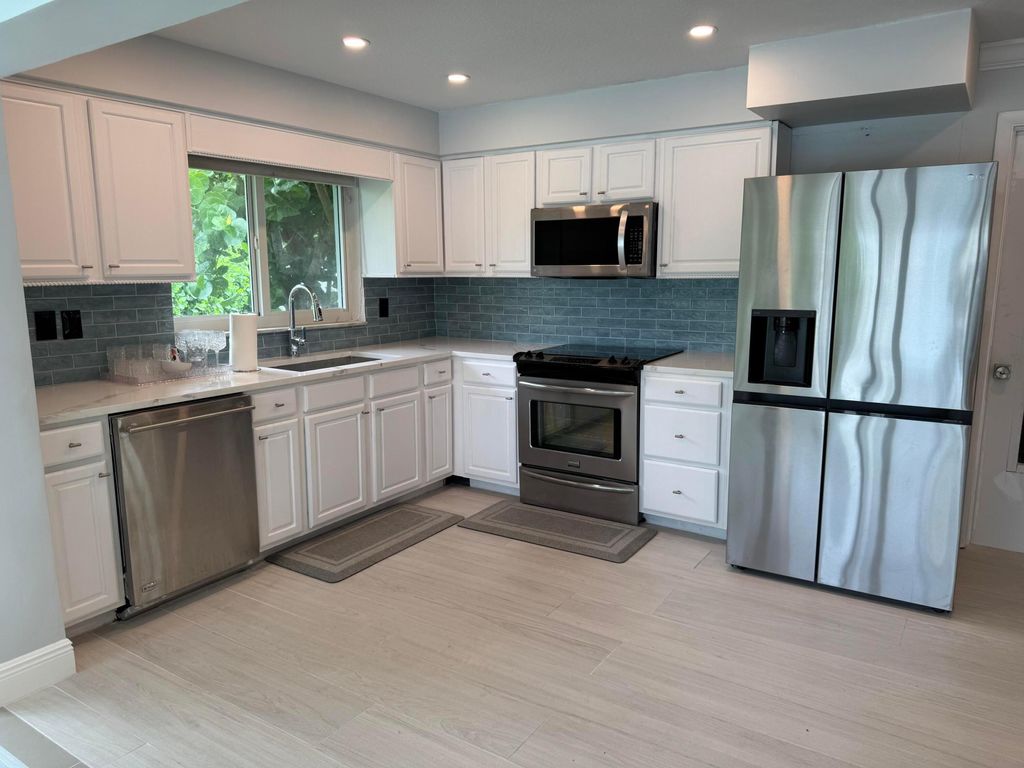 Photo of 16 Midlane Road, Ocean Ridge, FL 33435 (MLS # R11063158)