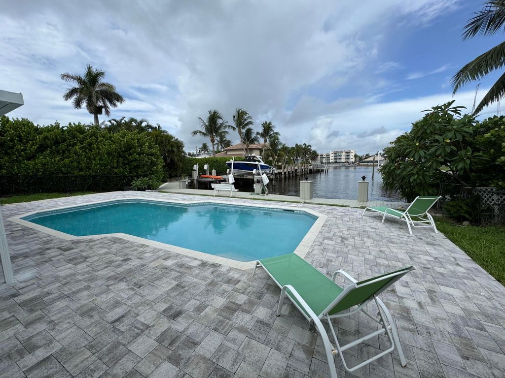 Photo of 16 Midlane Road, Ocean Ridge, FL 33435 (MLS # R11063158)