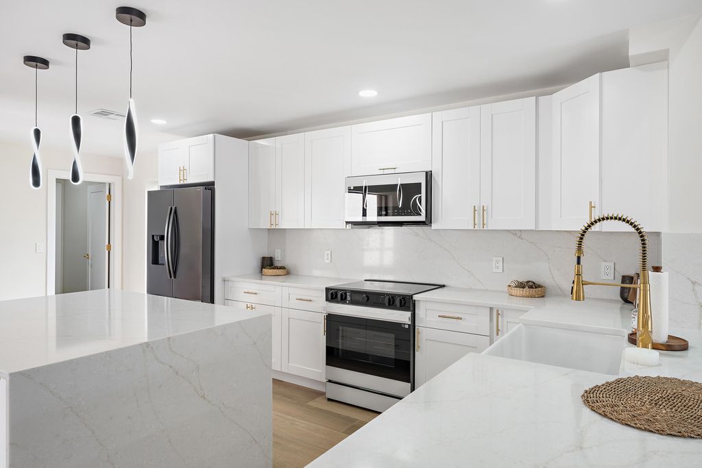 Photo of 37 Edinburgh Drive, Palm Beach Gardens, FL 33418 (MLS # R11155091)