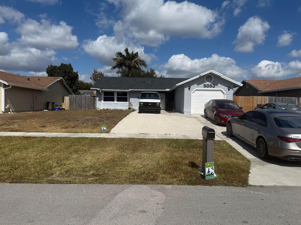 Photo of 5053 El Claro Circle, West Palm Beach, FL 33415 (MLS # R11163960)