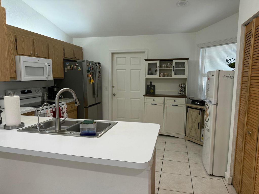 Photo of 5053 El Claro Circle, West Palm Beach, FL 33415 (MLS # R11163960)