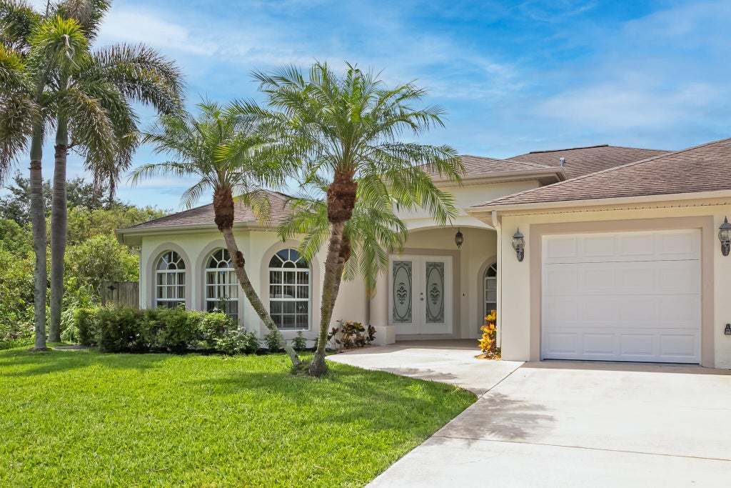 Photo of 1218 SW Santiago Avenue, Port Saint Lucie, FL 34953 (MLS # B26052433)