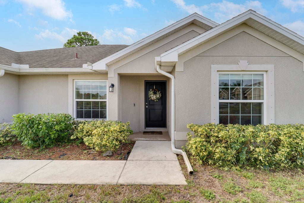 Photo of 5898 NW Joan Court, Port Saint Lucie, FL 34986 (MLS # R11117902)