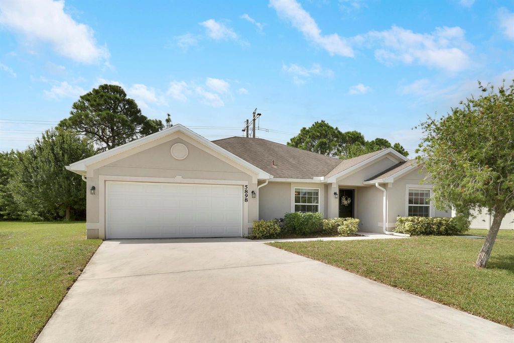 Photo of 5898 NW Joan Court, Port Saint Lucie, FL 34986 (MLS # R11117902)