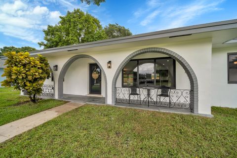 Photo of 7301 NW 13th Court, Plantation, FL 33313 (MLS # B26014193)