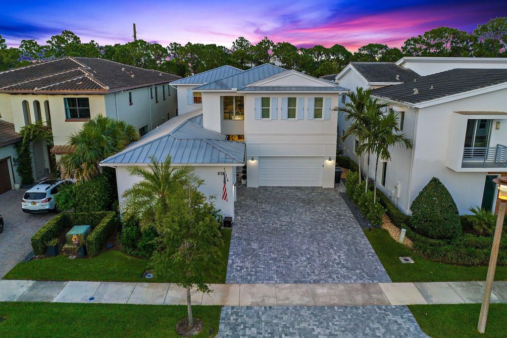 Photo of 1054 Faulkner Terrace, Palm Beach Gardens, FL 33410 (MLS # R10961526)