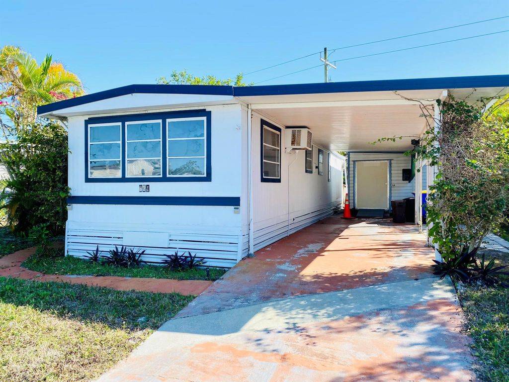 Photo of 321 NE Tropicalia Lane, Jensen Beach, FL 34957 (MLS # R11063465)