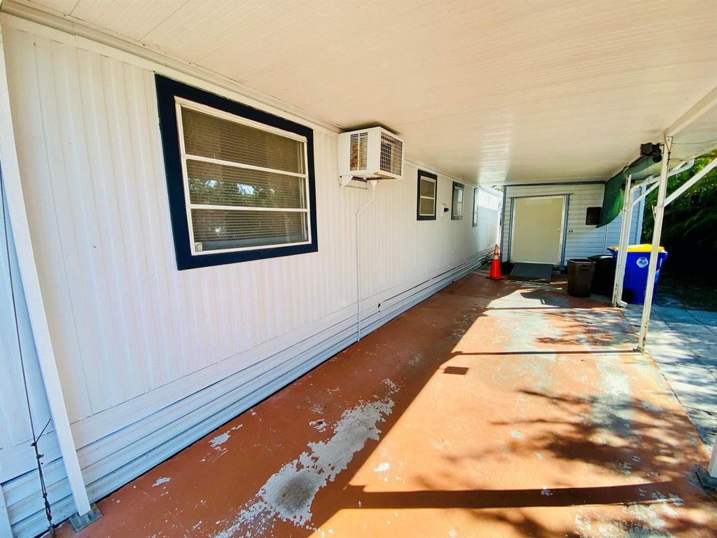 Photo of 321 NE Tropicalia Lane, Jensen Beach, FL 34957 (MLS # R11063465)