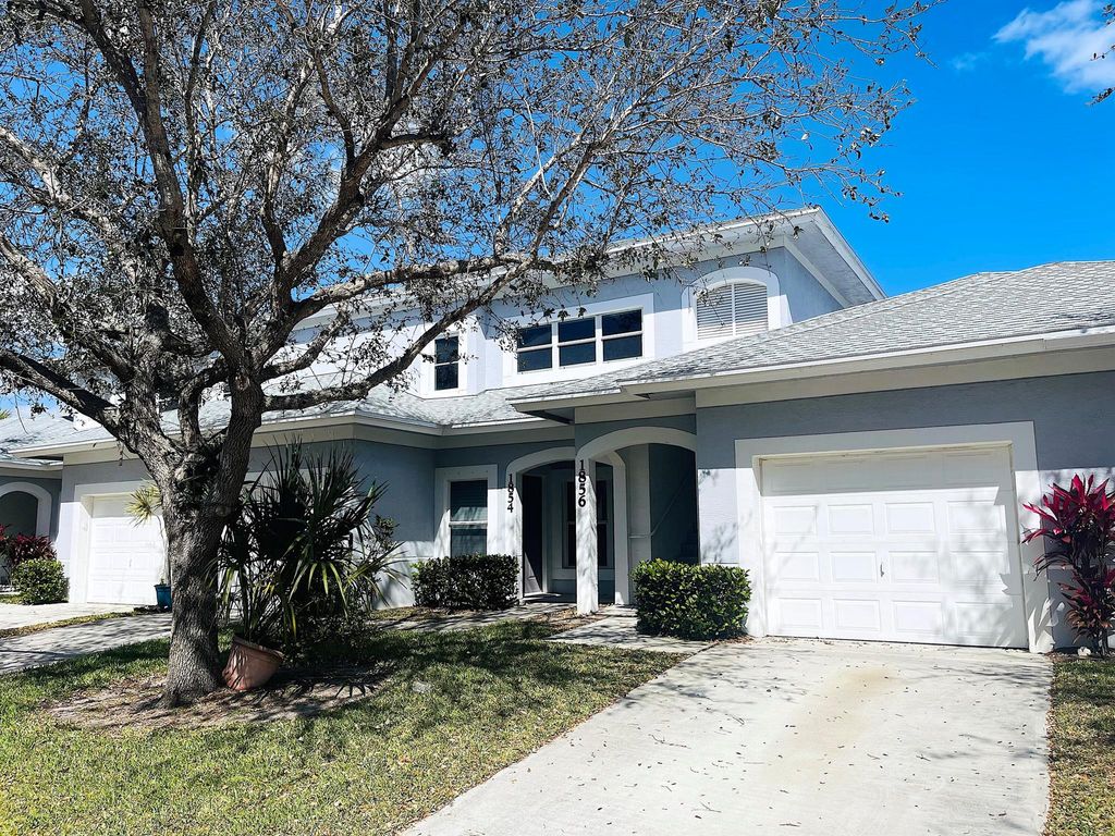 Photo of 1856 Sandhill Crane Drive, Fort Pierce, FL 34982 (MLS # R10963891)
