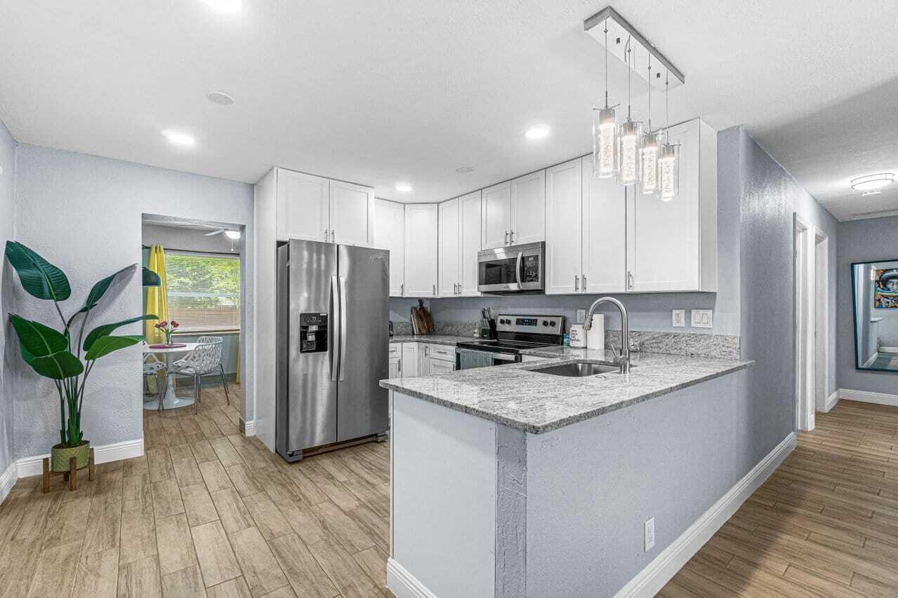 Make this beautifully designed mid-century modern home your next vacation retreat! Ideally located just three blocks from the vibrant Atlantic Avenue, this stylish and spacious residence is a true gem in the neighborhood. Fully furnished and turnkey, the home features an open and bright floor plan, a large fenced-in backyard with lush mango trees, and ample parking. Lawn care and WiFi are included for added convenience. Rental Options: Annual Lease: $3,450/month | Seasonal/Short-Term (90-day minimum): $3,750/month Don't miss out on this fantastic opportunity! ALL OFFERS CONSIDERED. UPDATED PHOTOS TO COME. AVAILABLE 11/1/2025