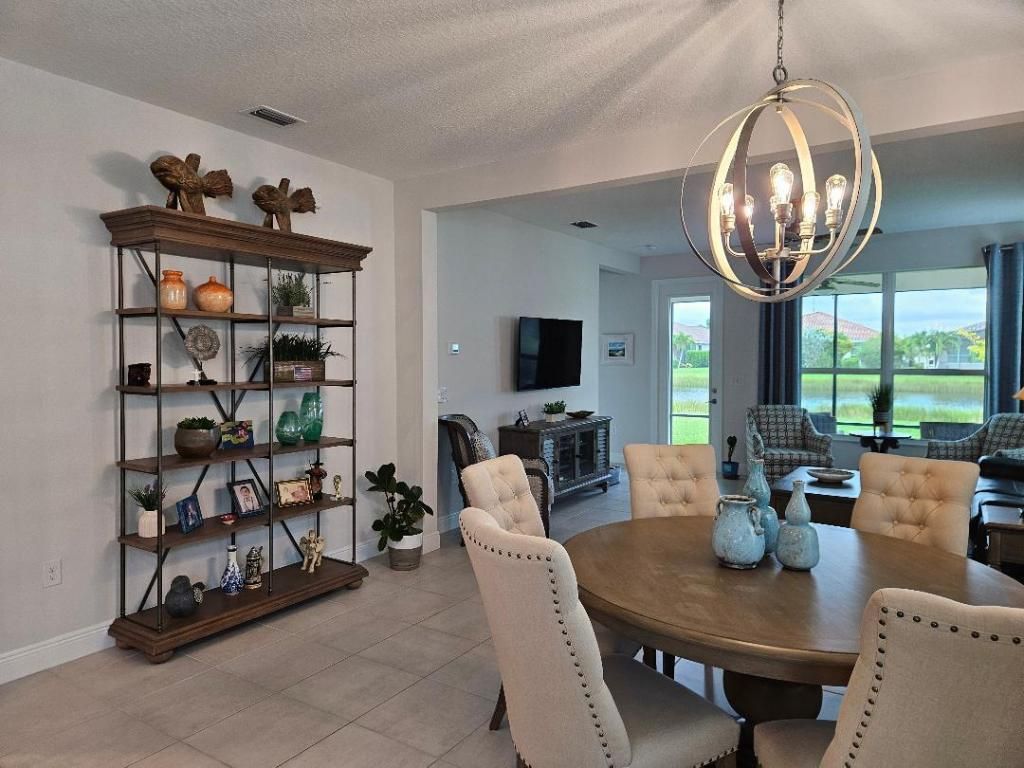 Photo of 9985 SW Trumpet Tree Circle, Port Saint Lucie, FL 34987 (MLS # R11133097)