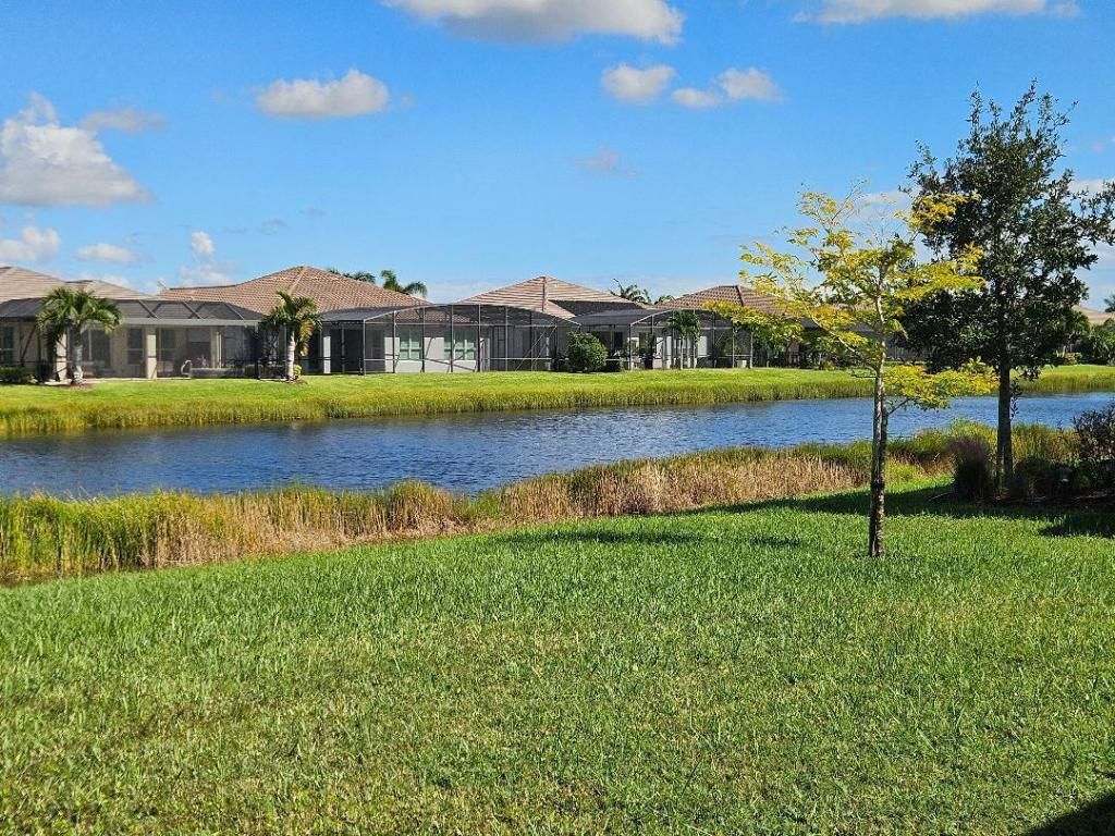 Photo of 9985 SW Trumpet Tree Circle, Port Saint Lucie, FL 34987 (MLS # R11133097)