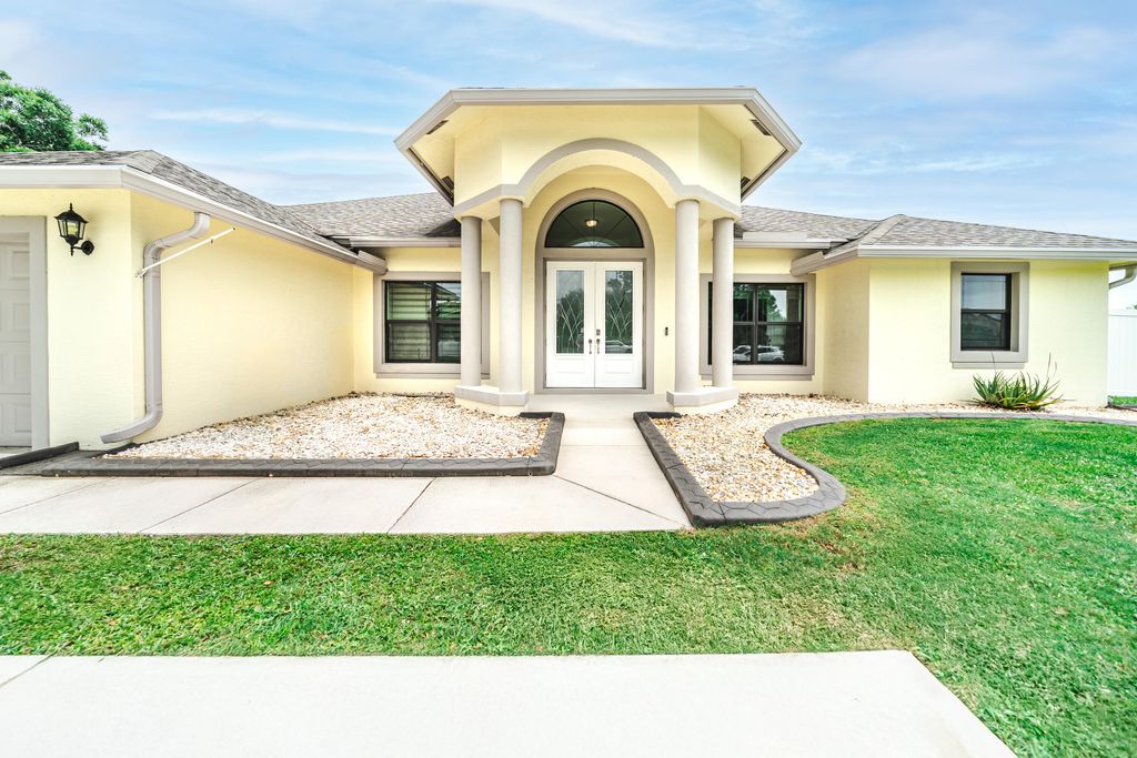 Photo of 1601 SW California Boulevard, Port Saint Lucie, FL 34953 (MLS # R11164754)