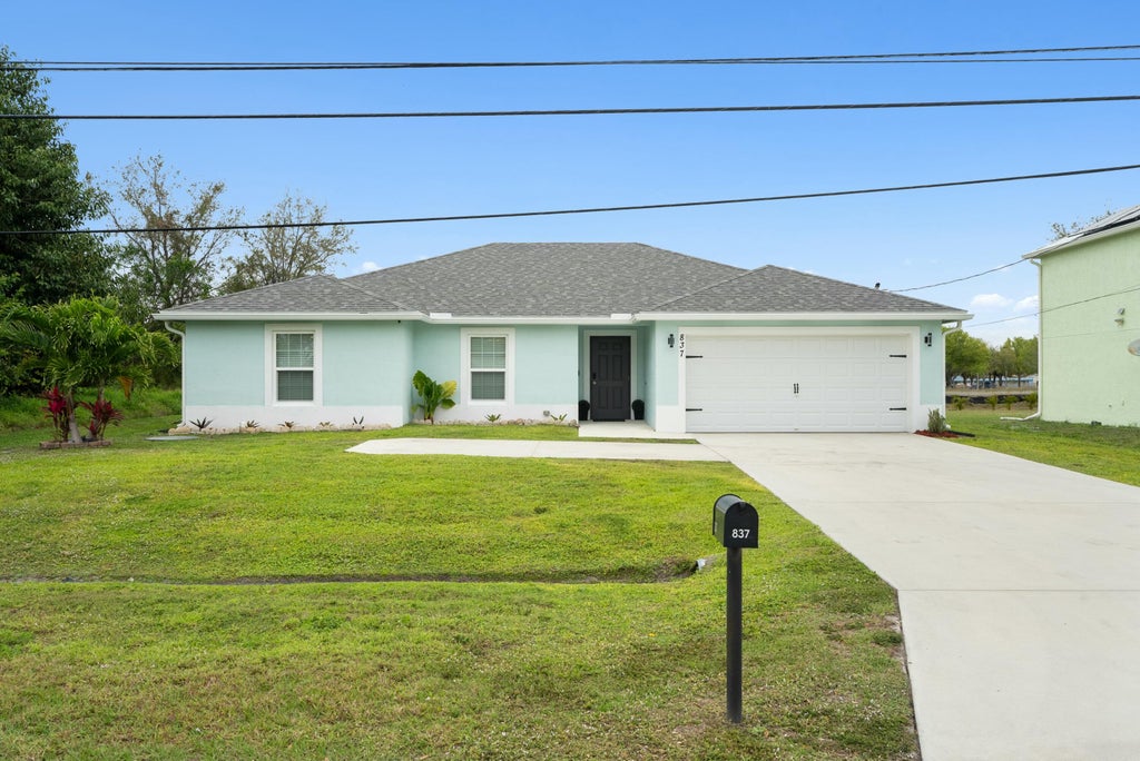 Photo of 837 SW Tulip Boulevard, Port Saint Lucie, FL 34953 (MLS # R11065349)