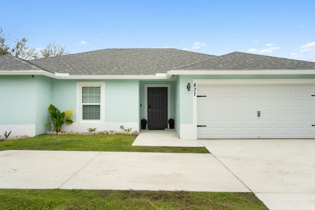 Photo of 837 SW Tulip Boulevard, Port Saint Lucie, FL 34953 (MLS # R11065349)