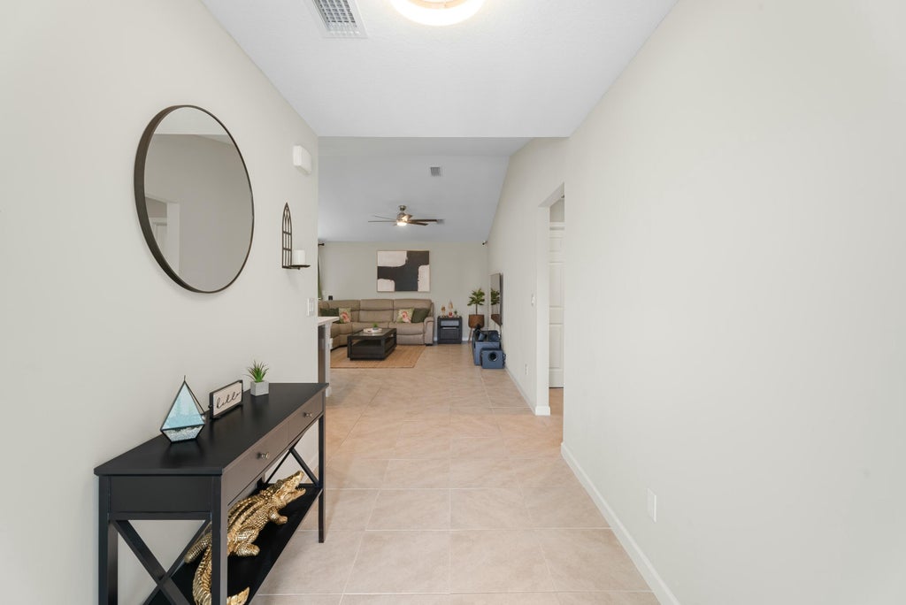 Photo of 837 SW Tulip Boulevard, Port Saint Lucie, FL 34953 (MLS # R11065349)