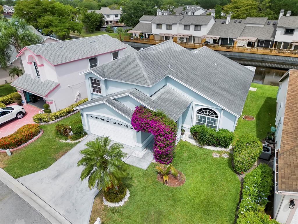 Photo of 104 Hammocks Court, Greenacres, FL 33413 (MLS # R10880545)