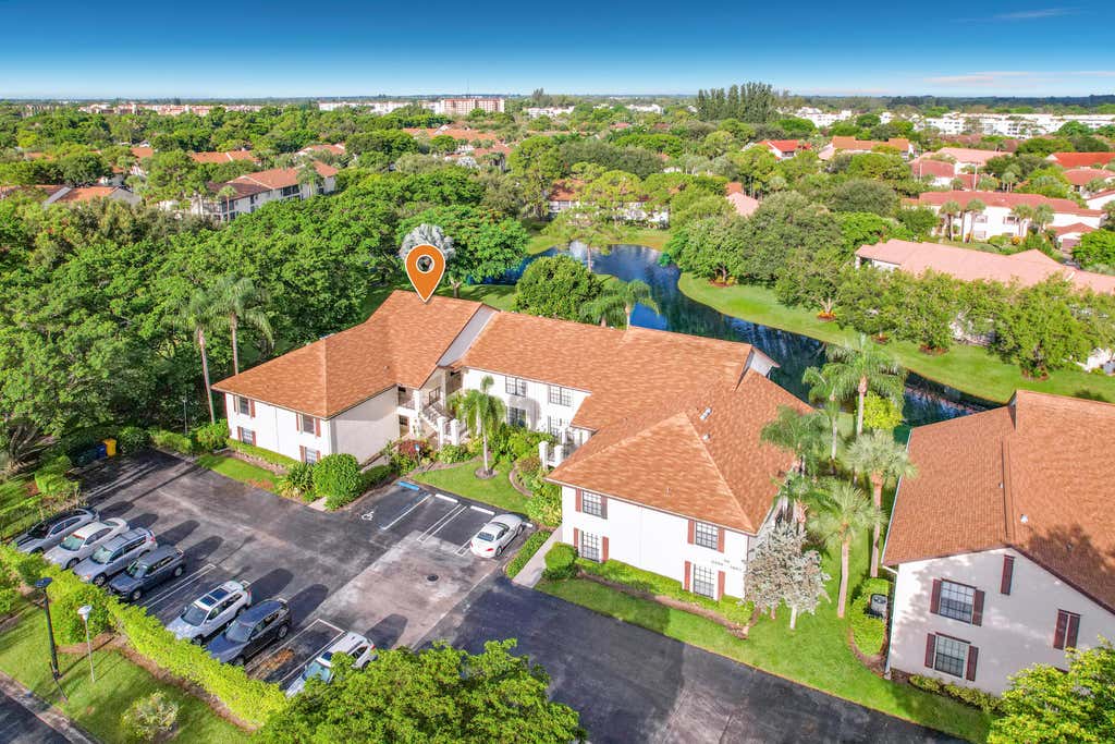 Photo of 3451 Jog Park Drive, Greenacres, FL 33467 (MLS # B26068502)