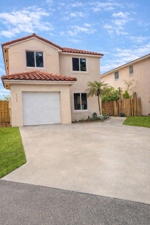Photo of 6363 Seagrape Circle, Margate, FL 33063 (MLS # B26001651)