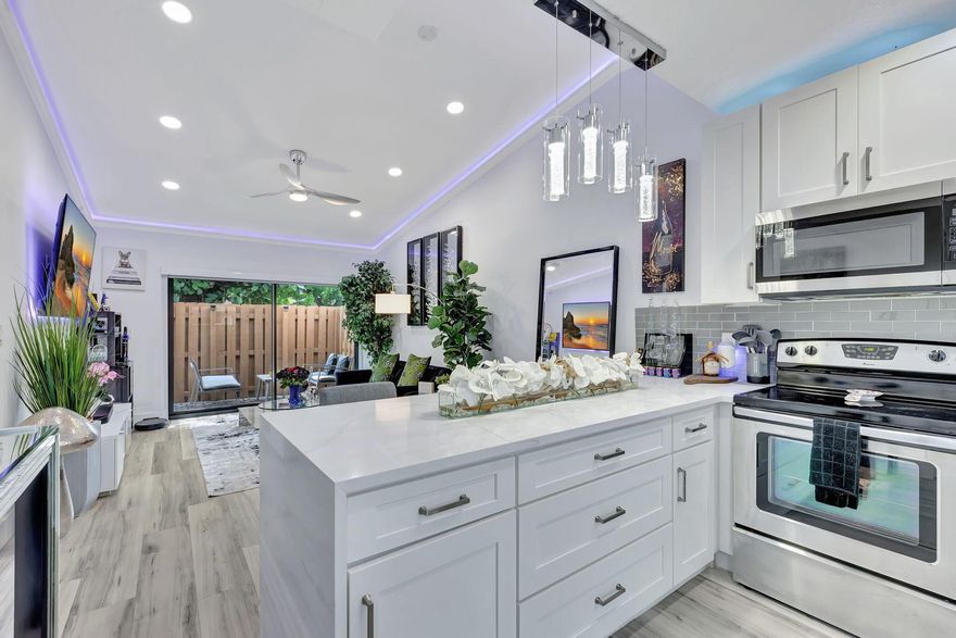 Gorgeous private Villa/Townhouse in the serene community of Centura Parc! This beautiful home boasts contemporary upgrades all throughout, meticulously maintained and fully upgraded. Home features Hurricane Impact windows and doors, open concept kitchen with newer stainless steel appliances, open floor plan for ideal flow and entertainment, custom LED lighting all throughout living areas and bathrooms, automatic blackout blinds, private backyard space with grill, perfect for BBQs and entertainment. Spacious rooms, walk-in master closet, washer & dryer in the unit and lots of storage space. Cable & Wi-fi included with the rent. Annual Lease ONLY. Unit also available for sale - Call today to book your private tour before its gone!