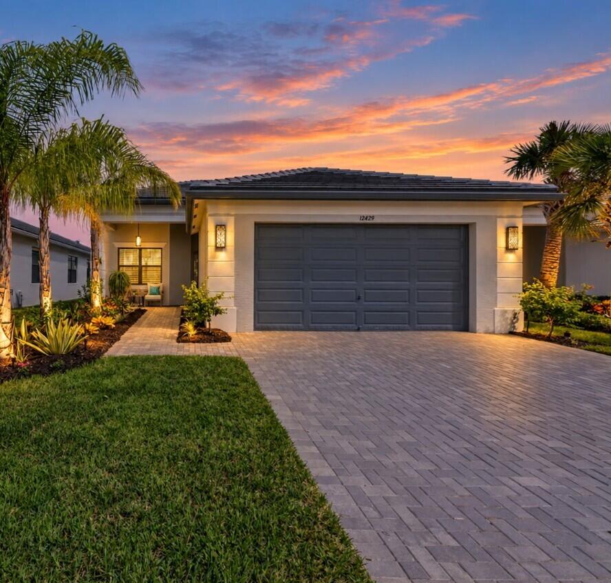 Photo of 12429 SW HIGH TIDE Road, Port Saint Lucie, FL 34987 (MLS # B26080046)