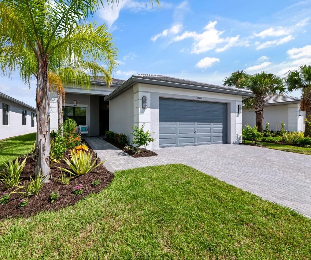 Photo of 12429 SW HIGH TIDE Road, Port Saint Lucie, FL 34987 (MLS # B26080046)