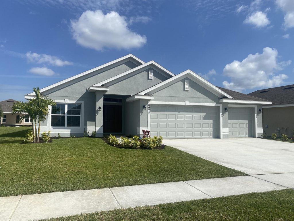 Photo of 8674 Pavia Street S, Fort Pierce, FL 34951 (MLS # R10969044)