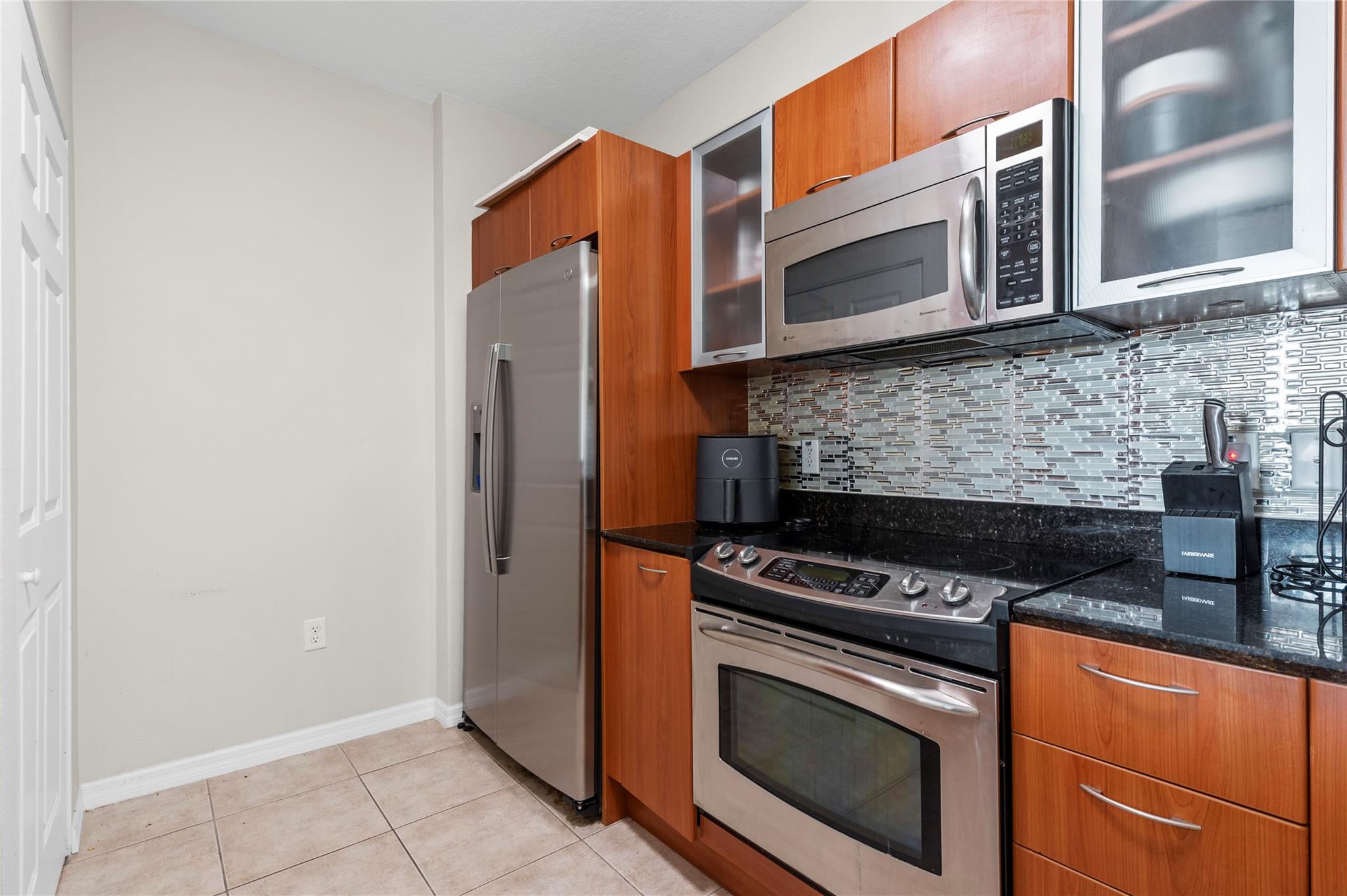 100 NE 6th St 209