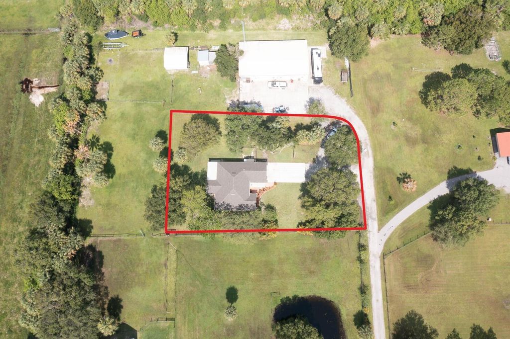 Photo of 2183 S Brocksmith Rd, Fort Pierce, FL 34945 (MLS # R10896953)