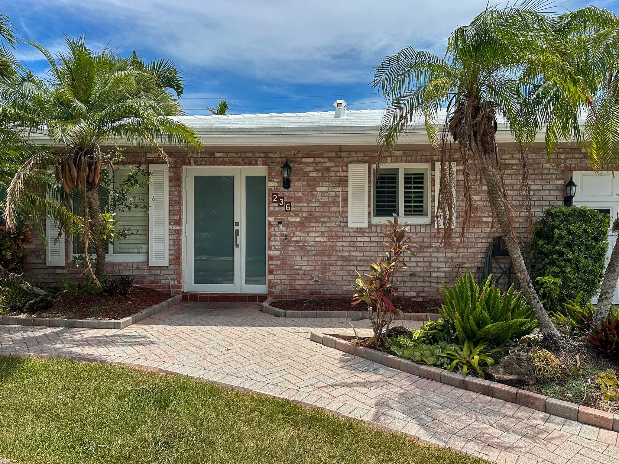 Located just a short walk from the beach, this 2-bedroom, 3-bath attached home offers a spacious open layout with an oversized 2-car garage. The home features a beautiful kitchen, comfortable living and dining areas, a bonus den along with two well-sized bedrooms. Additional features include a screened patio, in-unit laundry, and a circular driveway. Just a few minutes from local shopping, beaches and restaurants.