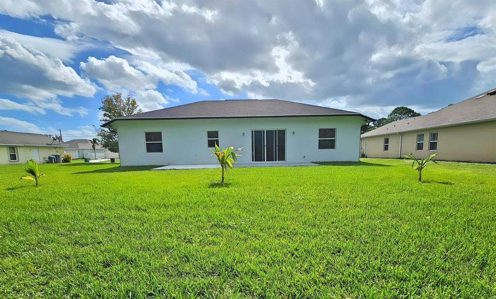 Photo of 5833 NW Wesley Road, Port St Lucie, FL 34986 (MLS # R11036777)
